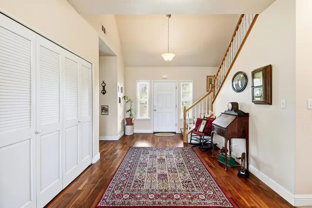 a kitchen with stainless steel appliances granite countertop a stove and a sink