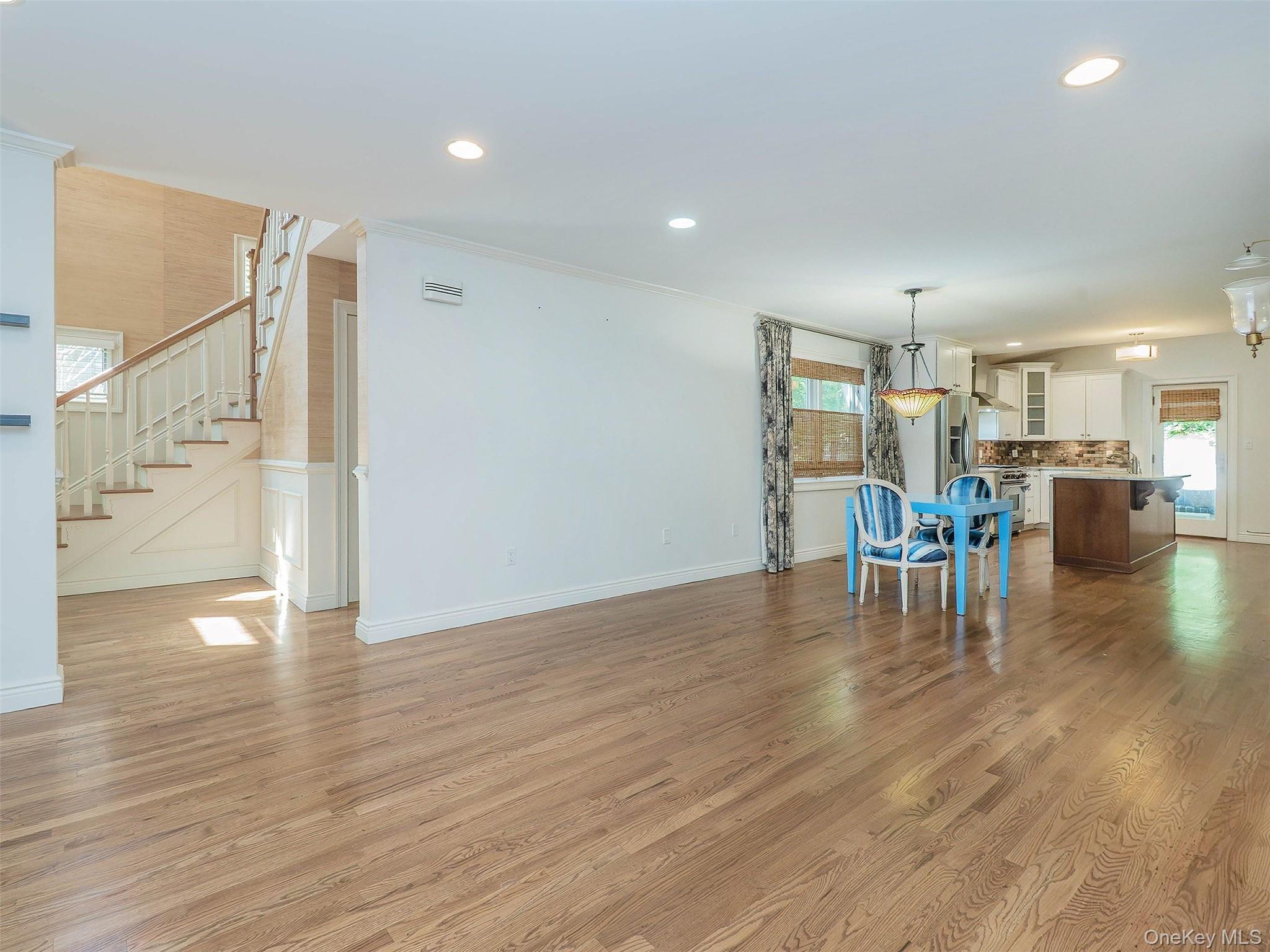 21 Marwood Road North Port Washington, NY 11050 - Photo 5 of 35 a view of a dining room with furniture and wooden floor