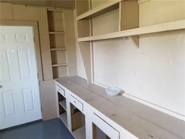 a view of a kitchen with a sink and dishwasher