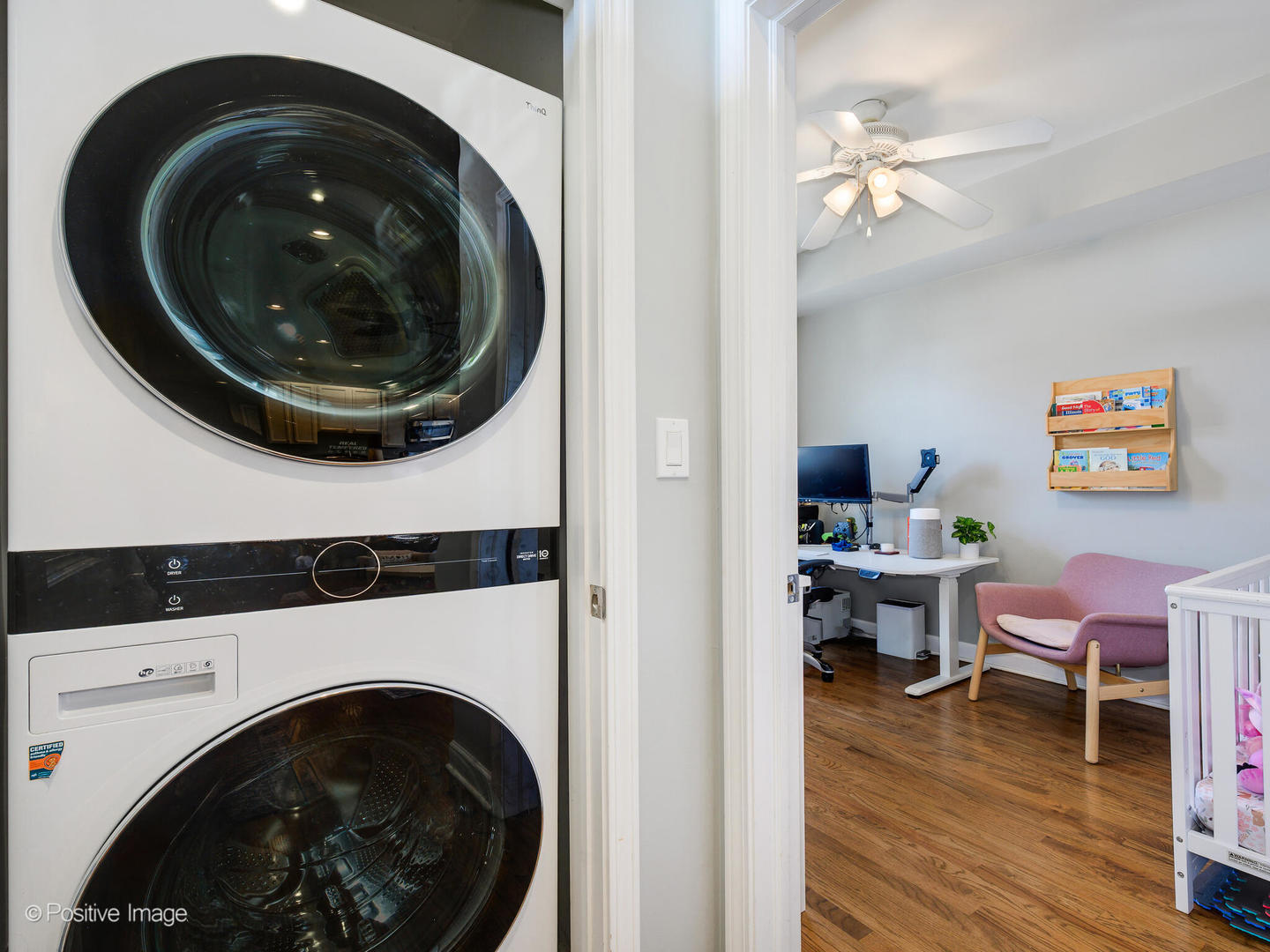 4022 North Monticello Avenue, Unit 3N Chicago, IL 60618 - Photo 12 of 21 a view of a room with washer and dryer