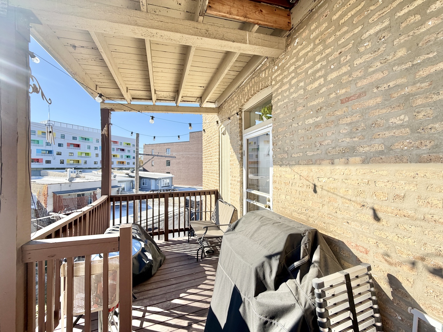 4022 North Monticello Avenue, Unit 3N Chicago, IL 60618 - Photo 17 of 21 a view of balcony with furniture