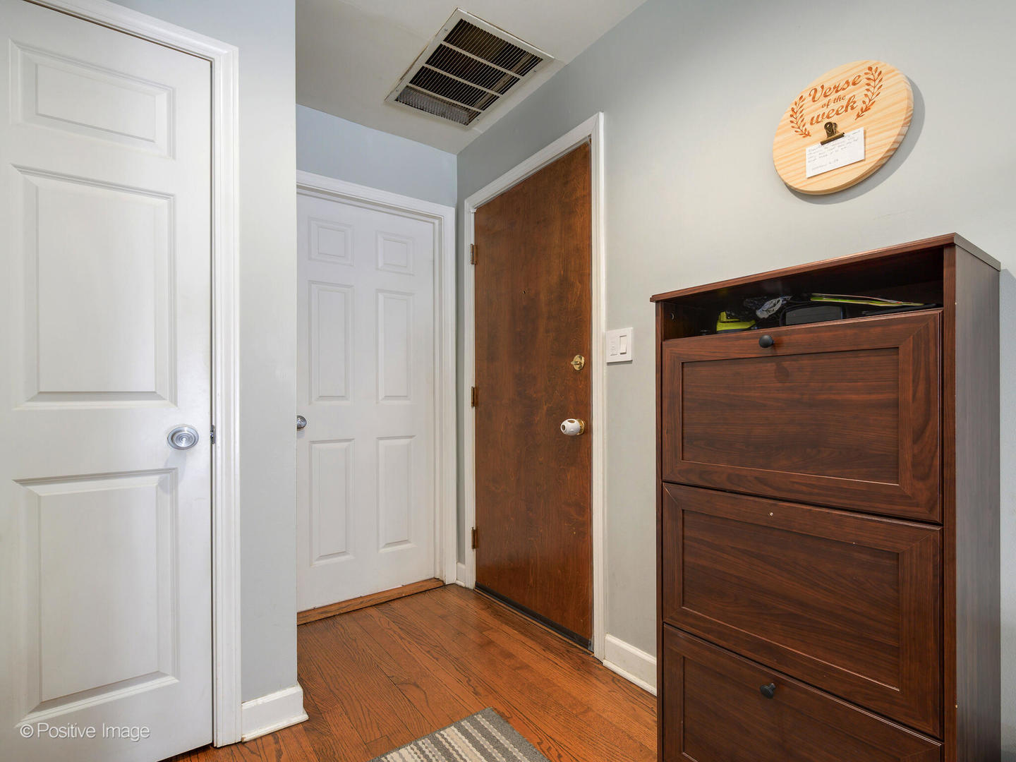 4022 North Monticello Avenue, Unit 3N Chicago, IL 60618 - Photo 2 of 21 a view of a hallway with wooden floor