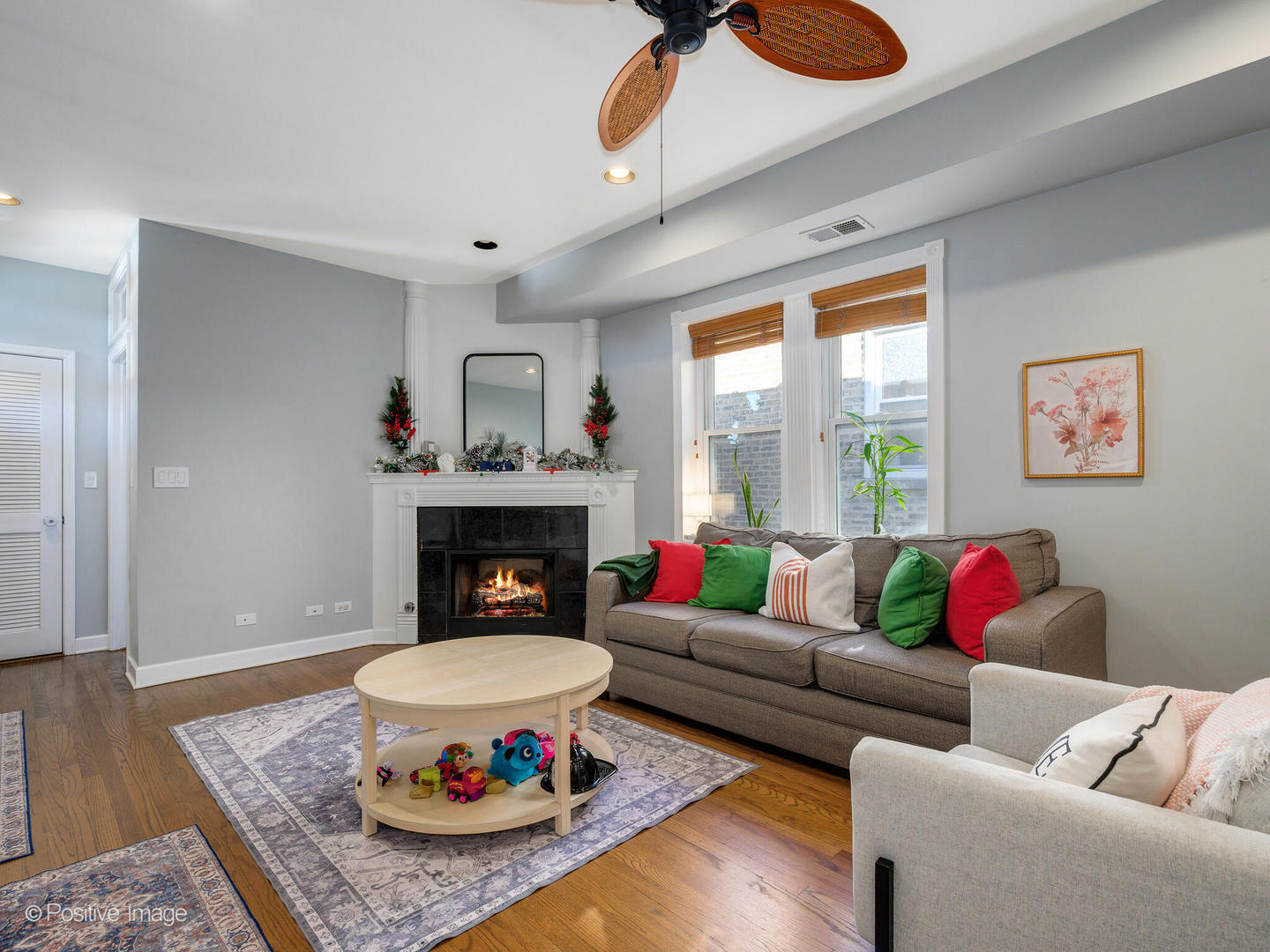 4022 North Monticello Avenue, Unit 3N Chicago, IL 60618 - Photo 4 of 21 a living room with furniture and a fireplace