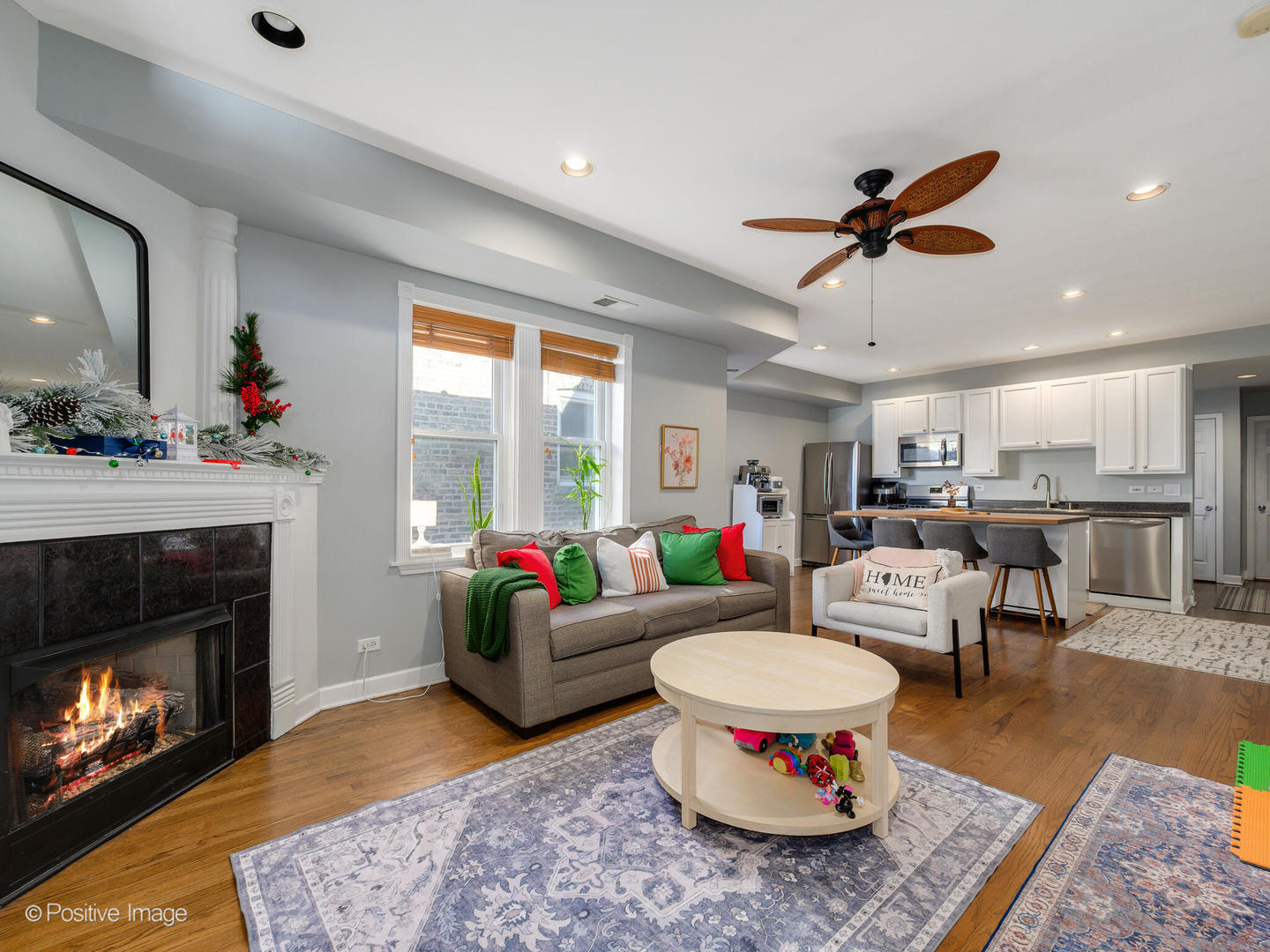 4022 North Monticello Avenue, Unit 3N Chicago, IL 60618 - Photo 6 of 21 a living room with furniture and a fireplace