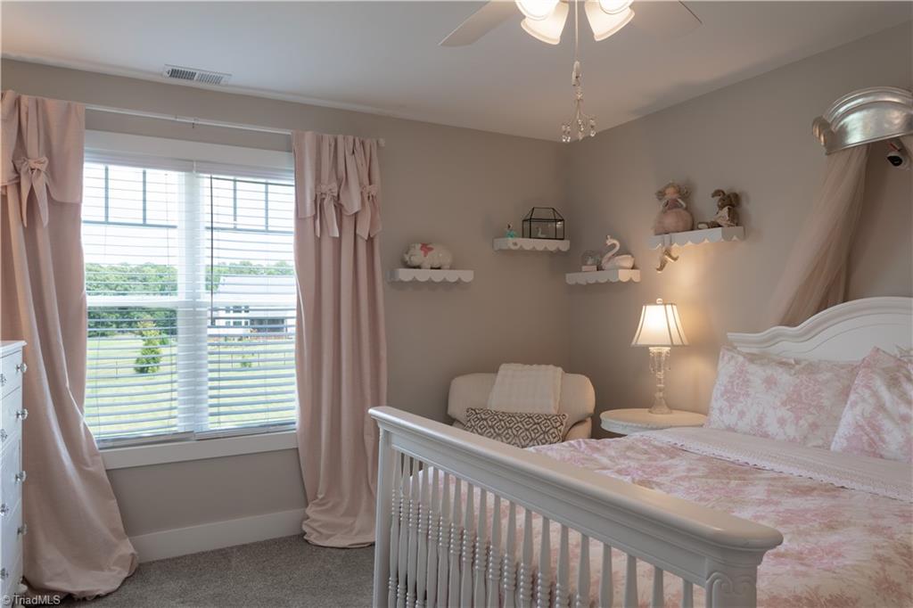 393 Scout Road Lexington, NC 27292 - Photo 33 of 47 Enjoy a birds eye view of the lovely backyard from this room fit for a VERY special person!