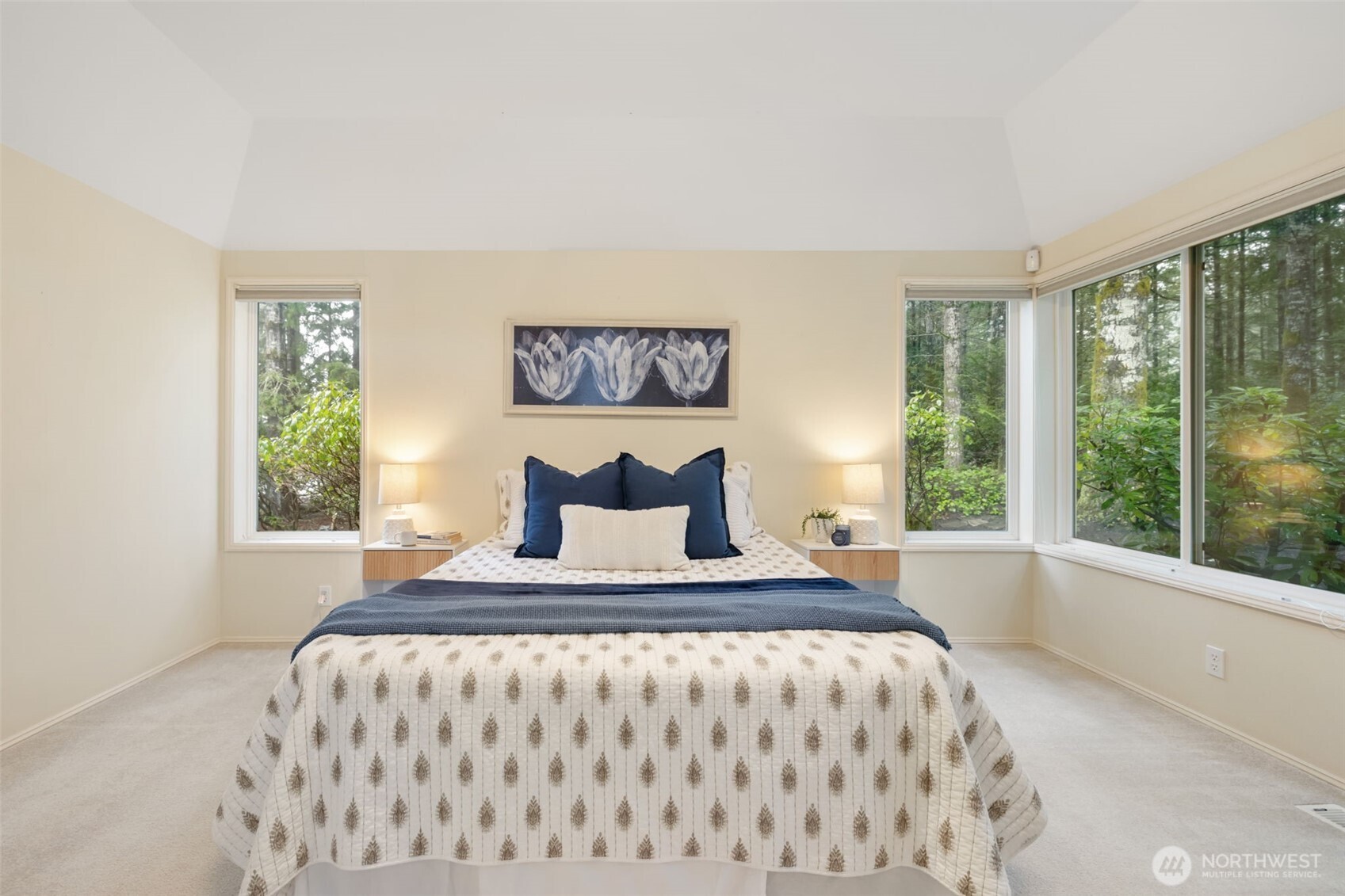 7033 Prestwick Lane Southwest Port Orchard, WA 98367 - Photo 19 of 39 a bedroom with a large bed and a large window
