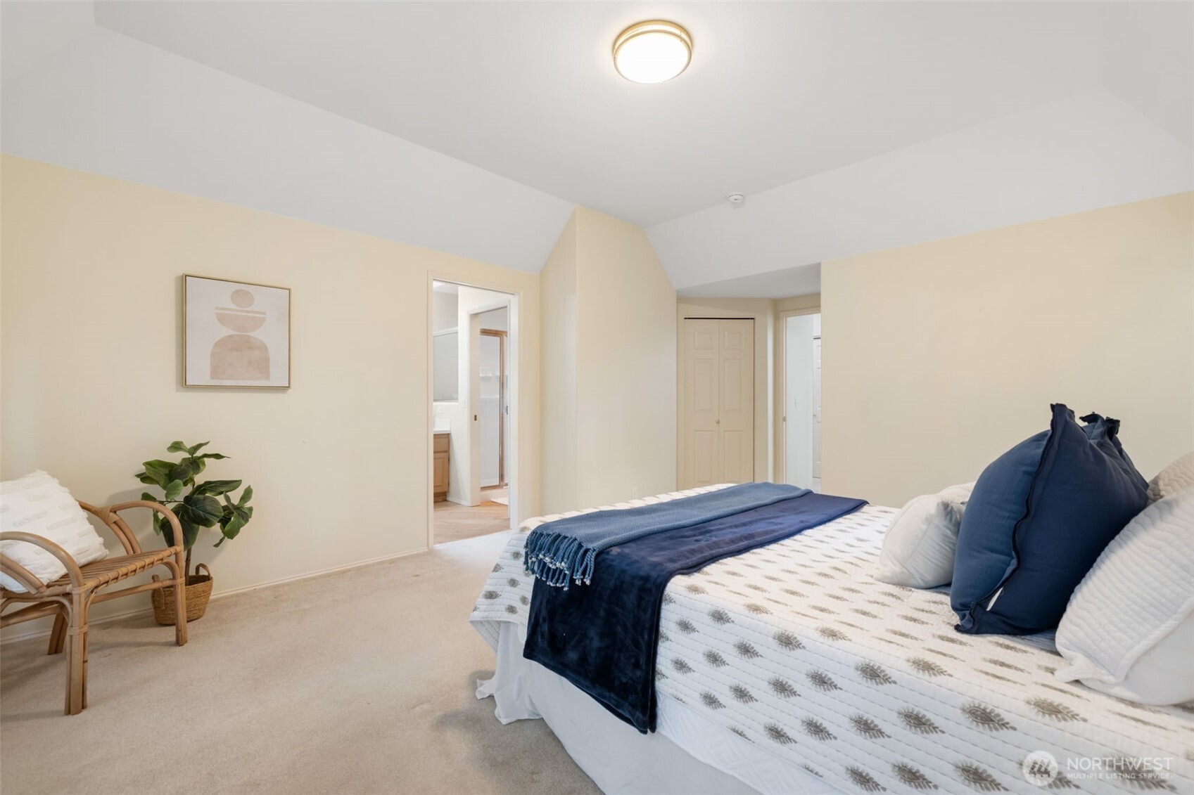 7033 Prestwick Lane Southwest Port Orchard, WA 98367 - Photo 20 of 39 a bedroom with a bed and a couch