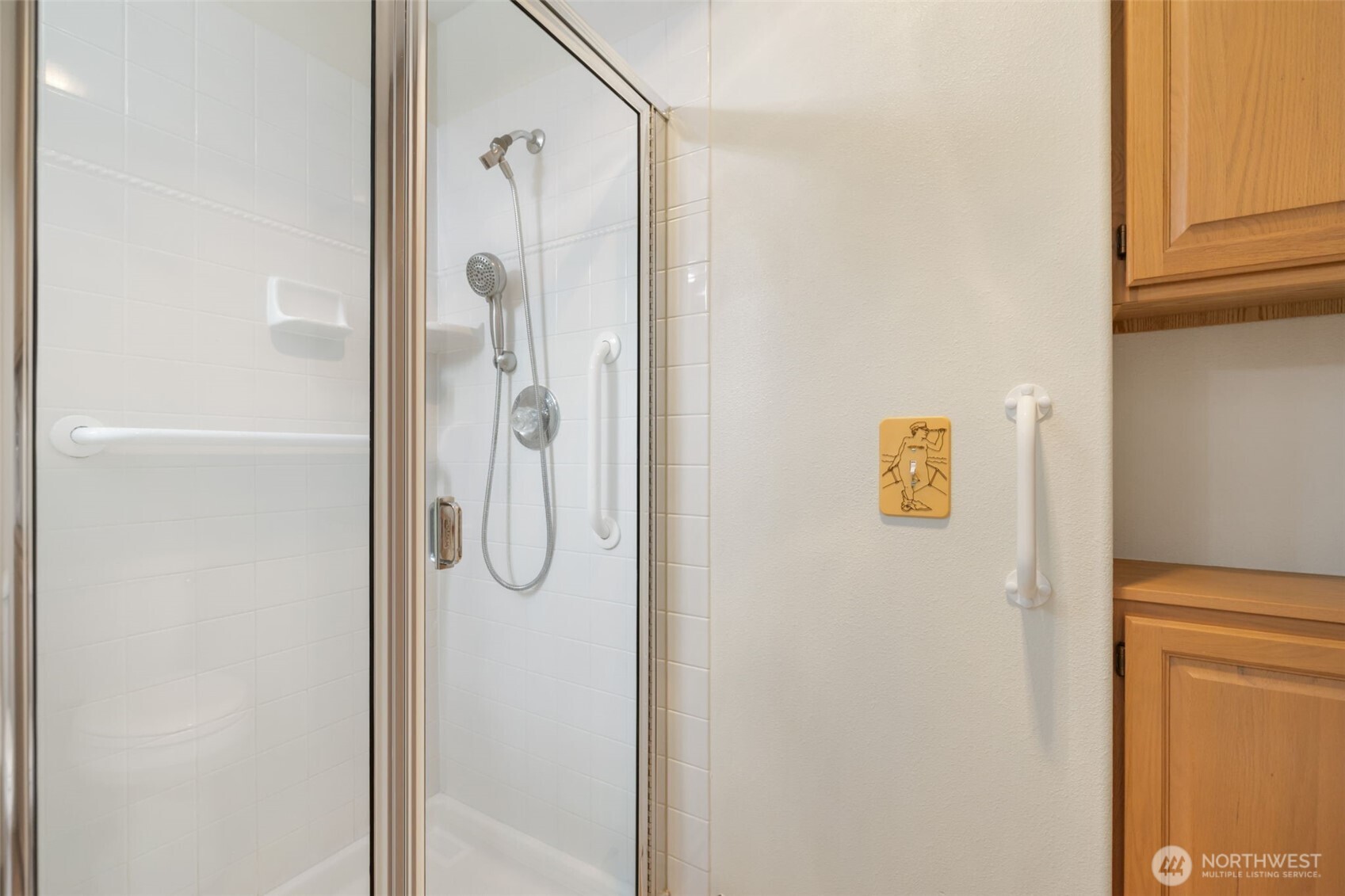 7033 Prestwick Lane Southwest Port Orchard, WA 98367 - Photo 23 of 39 a bathroom with a shower