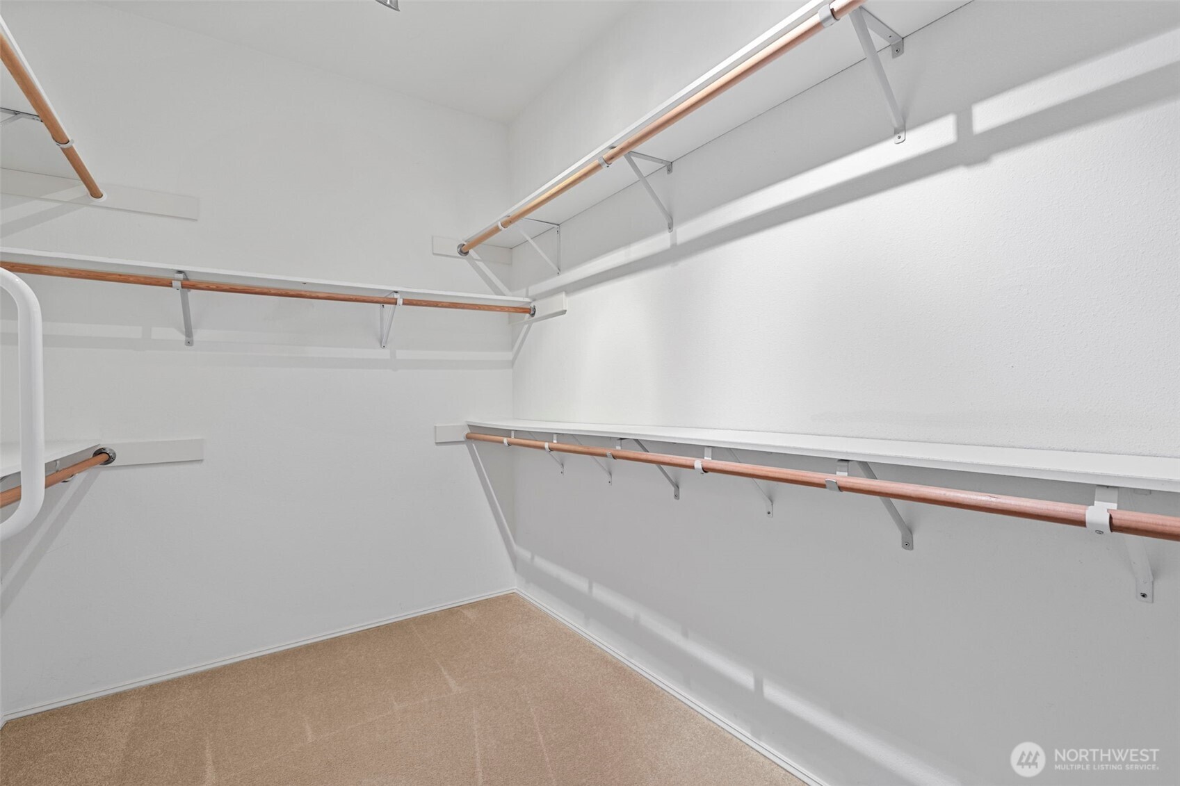 7033 Prestwick Lane Southwest Port Orchard, WA 98367 - Photo 24 of 39 a view of a room with racks on the wall