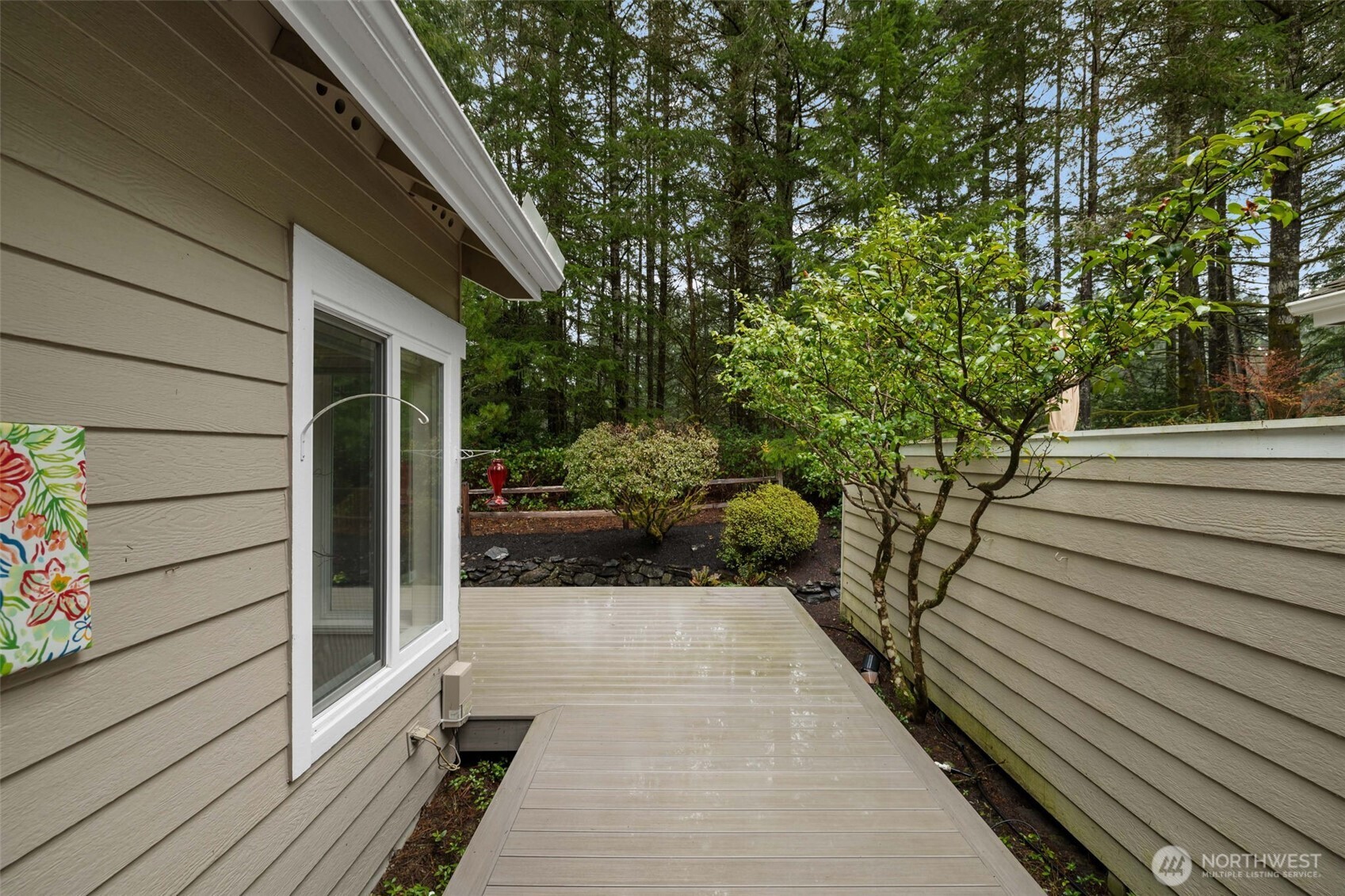 7033 Prestwick Lane Southwest Port Orchard, WA 98367 - Photo 25 of 39 a balcony with view of car parked