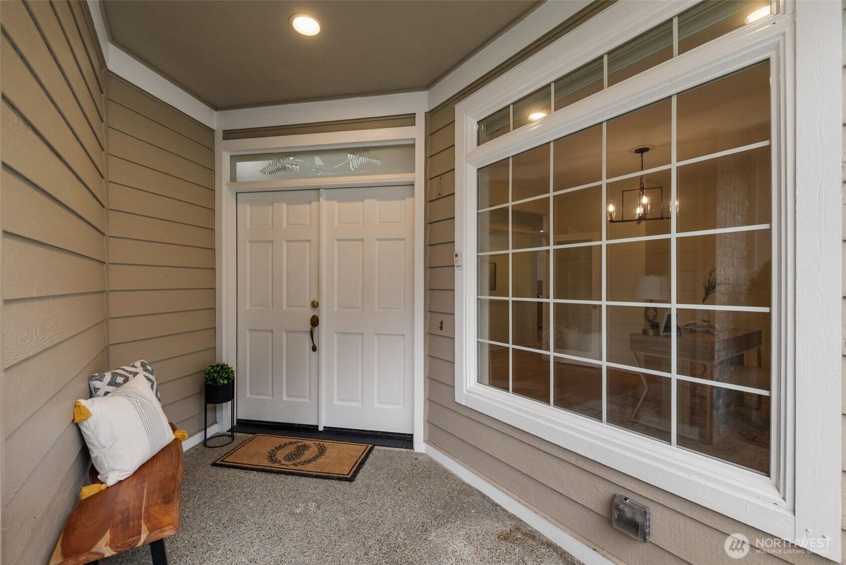 7033 Prestwick Lane Southwest Port Orchard, WA 98367 - Photo 3 of 39 a view of a room with door
