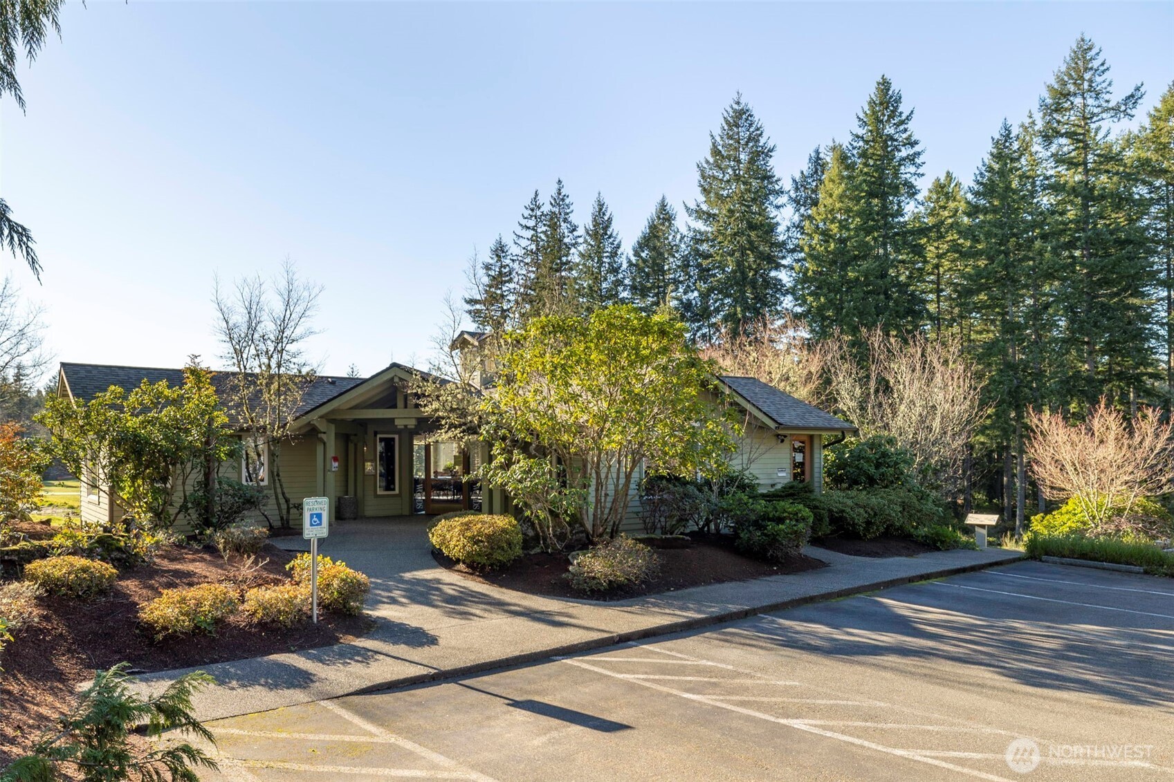 7033 Prestwick Lane Southwest Port Orchard, WA 98367 - Photo 32 of 39 a view of a house with a yard and tree s