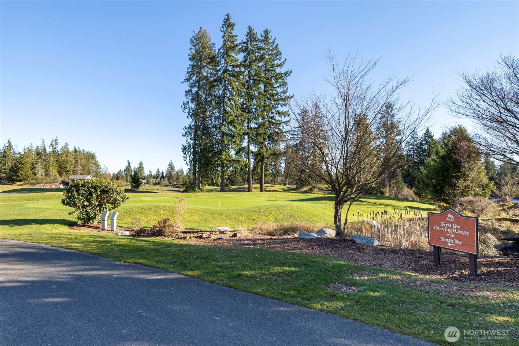 7033 Prestwick Lane Southwest Port Orchard, WA 98367 - Photo 35 of 39 a view of a park with large trees