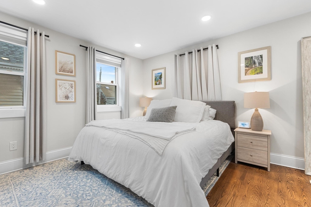 43 Alfred Street, Unit A Everett, MA 02149 - Photo 20 of 29 a bedroom with a bed and a window