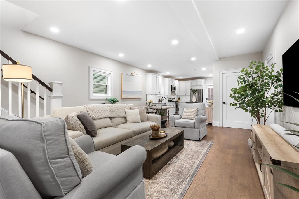 43 Alfred Street, Unit A Everett, MA 02149 - Photo 8 of 29 a living room with furniture and a potted plant