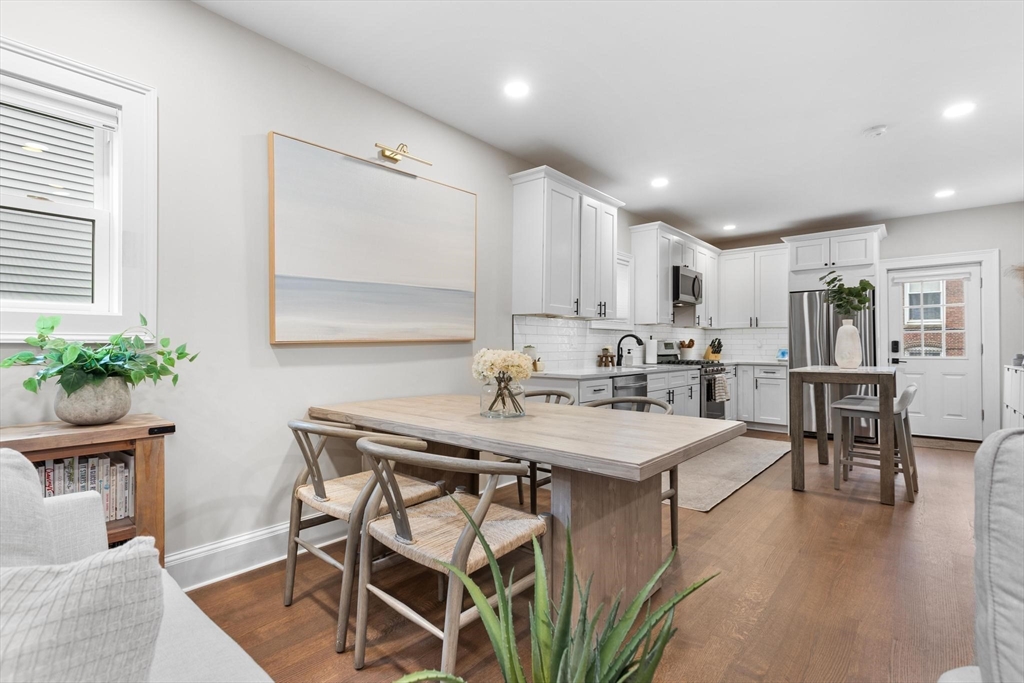 43 Alfred Street, Unit A Everett, MA 02149 - Photo 9 of 29 a view of kitchen with cabinets table and chairs