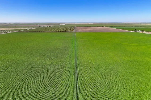 a view of a field with an outdoor space