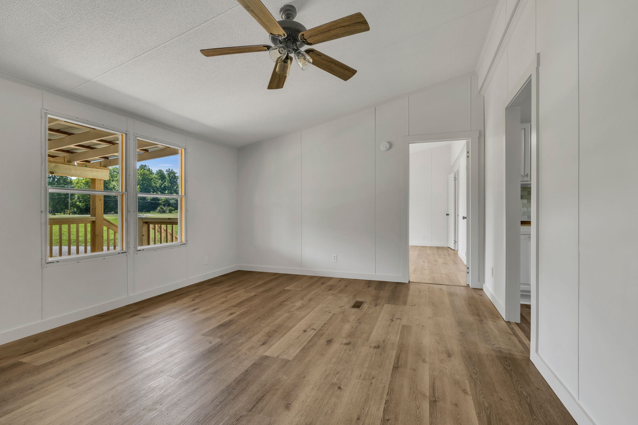 1894 Parker Road Manchester, TN 37355 - Photo 20 of 39 a view of empty room with wooden floor and fan