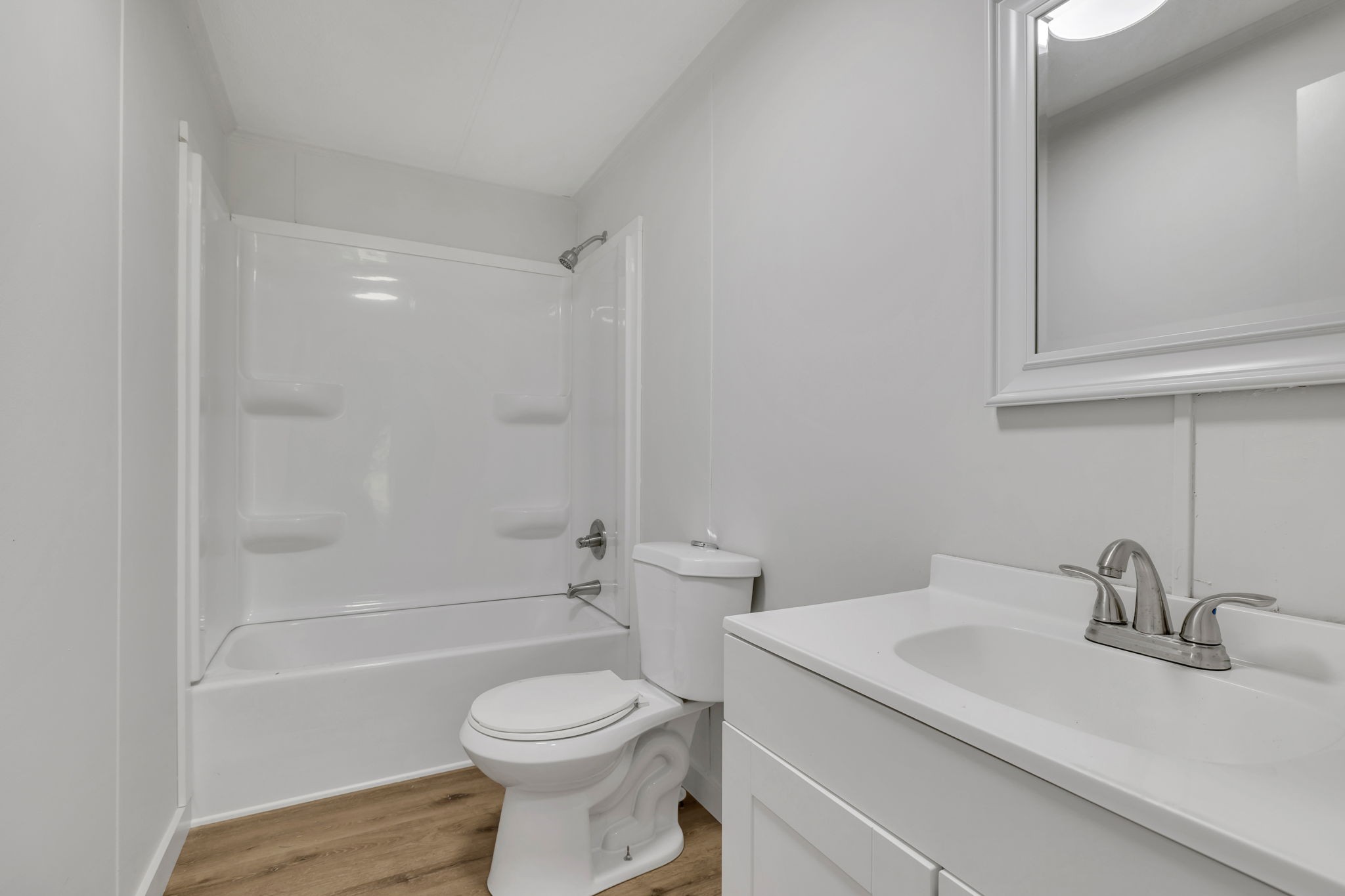 1894 Parker Road Manchester, TN 37355 - Photo 29 of 39 a bathroom with a sink toilet and shower