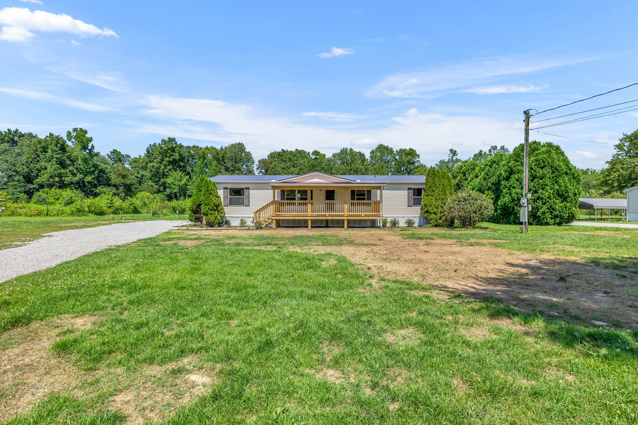 1894 Parker Road Manchester, TN 37355 - Photo 36 of 39 a front view of a house with a yard