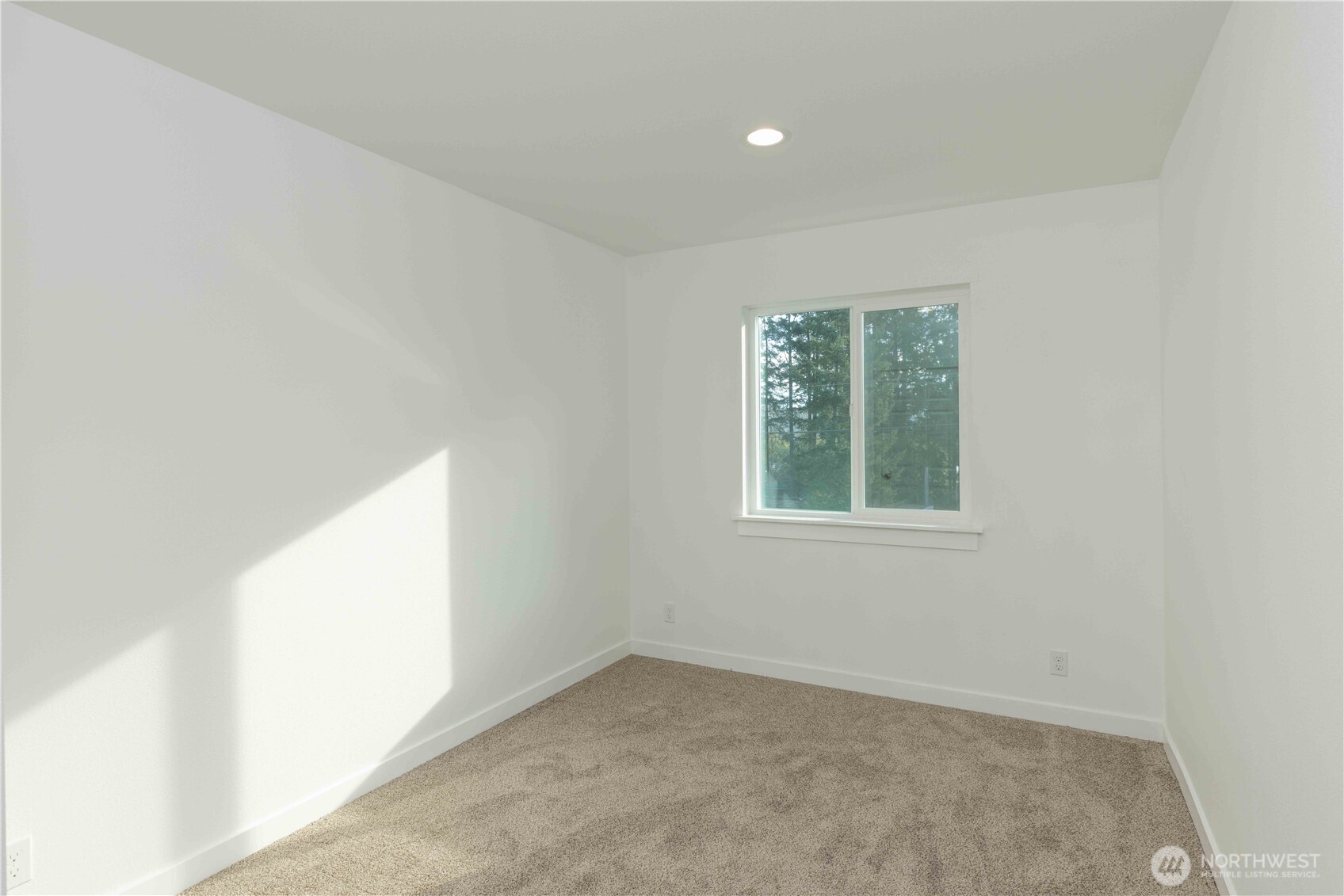 371 East Sullivan Street Allyn, WA 98524 - Photo 13 of 21 an empty room with a window