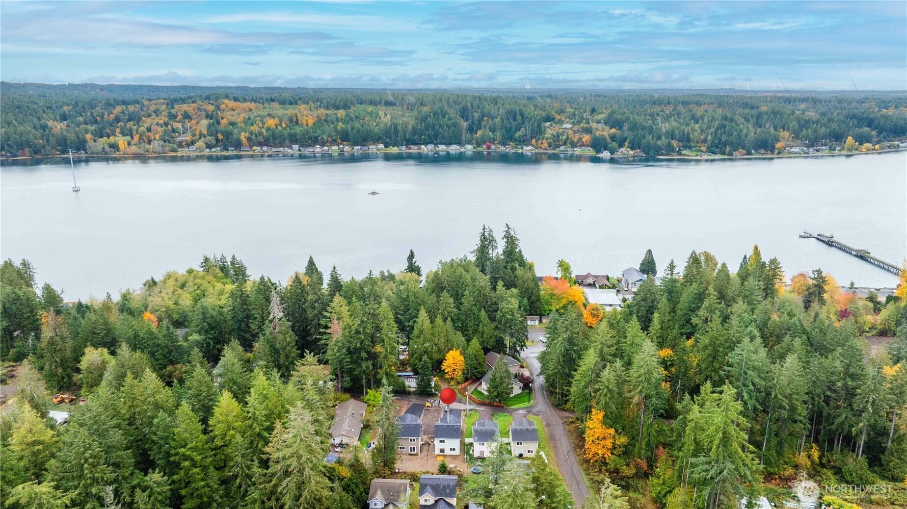 371 East Sullivan Street Allyn, WA 98524 - Photo 20 of 21 an aerial view of a city with houses with lake view