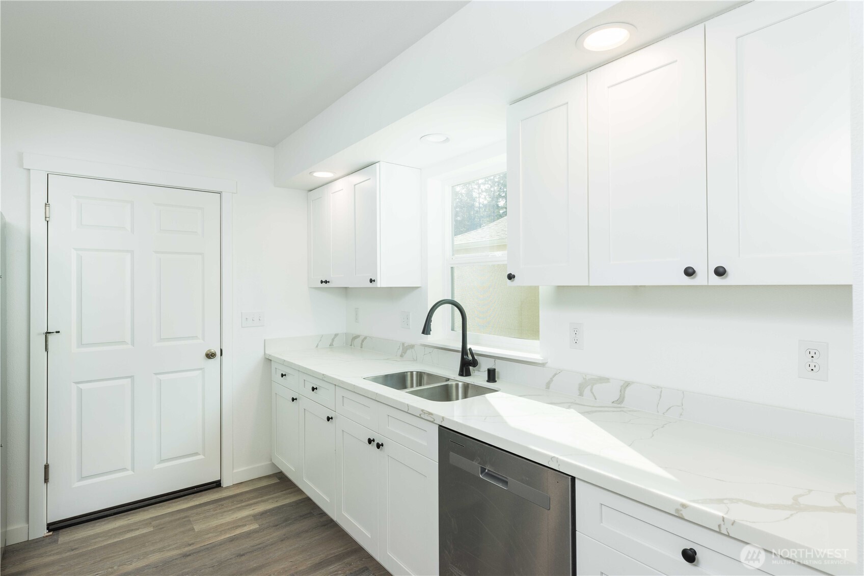 371 East Sullivan Street Allyn, WA 98524 - Photo 7 of 21 a kitchen with a sink and cabinets