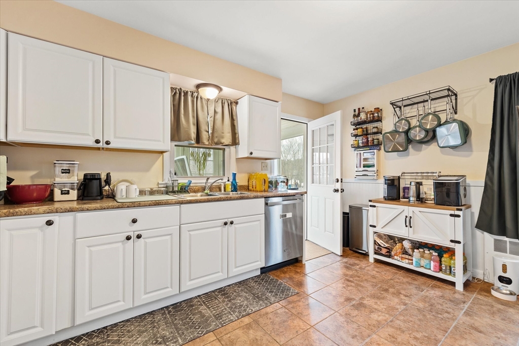 7 Holbrook Road, Unit 2 Oxford, MA 01540 - Photo 7 of 14 a kitchen with cabinets and window