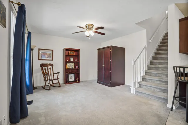 a view of a dining room with furniture window and outside view