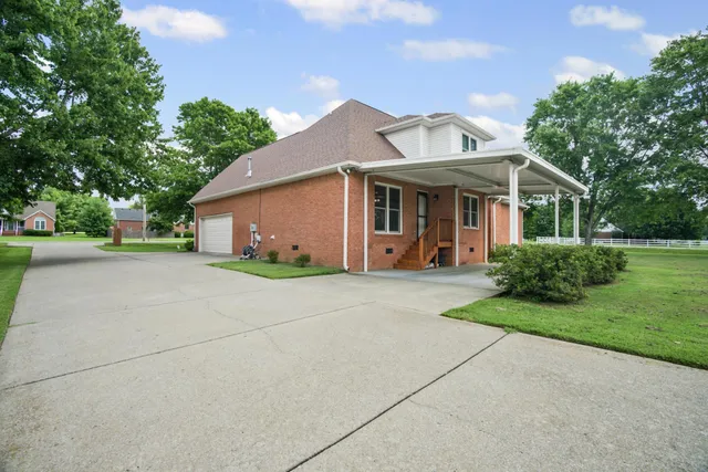 front view of a house with a big yard