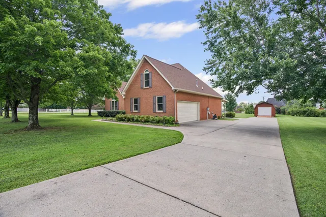 a view of a tables and chairs in a patio