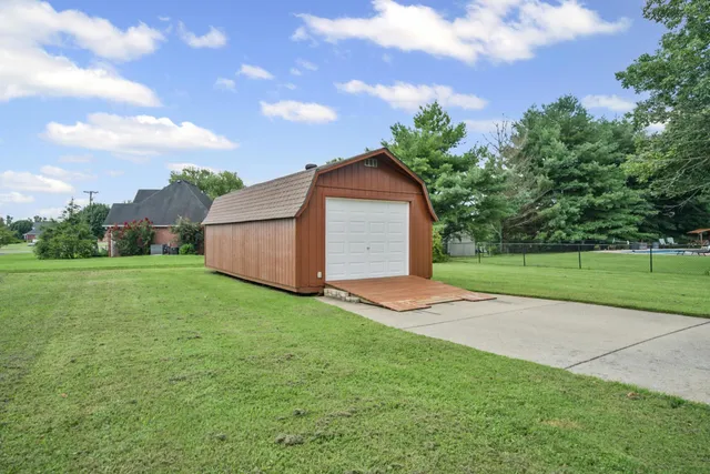 a view of a house with a big yard