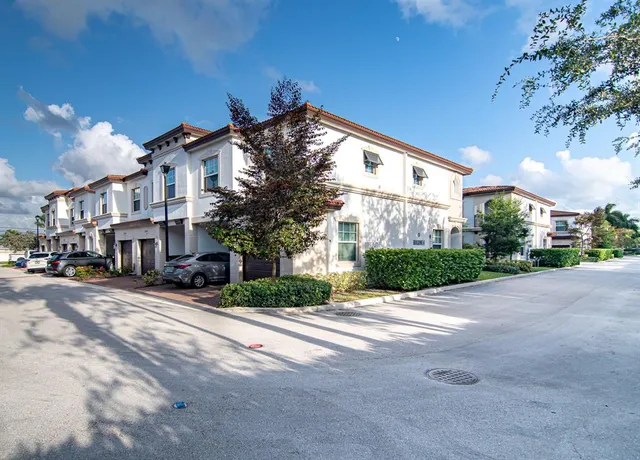 a view of a building with a street