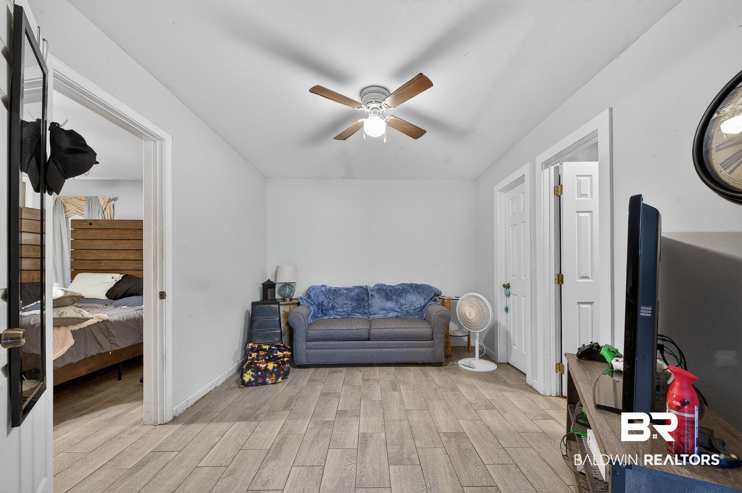 29635 Gardner Road Elberta, AL 36530 - Photo 47 of 66 Living area featuring light wood finished floors and ceiling fan