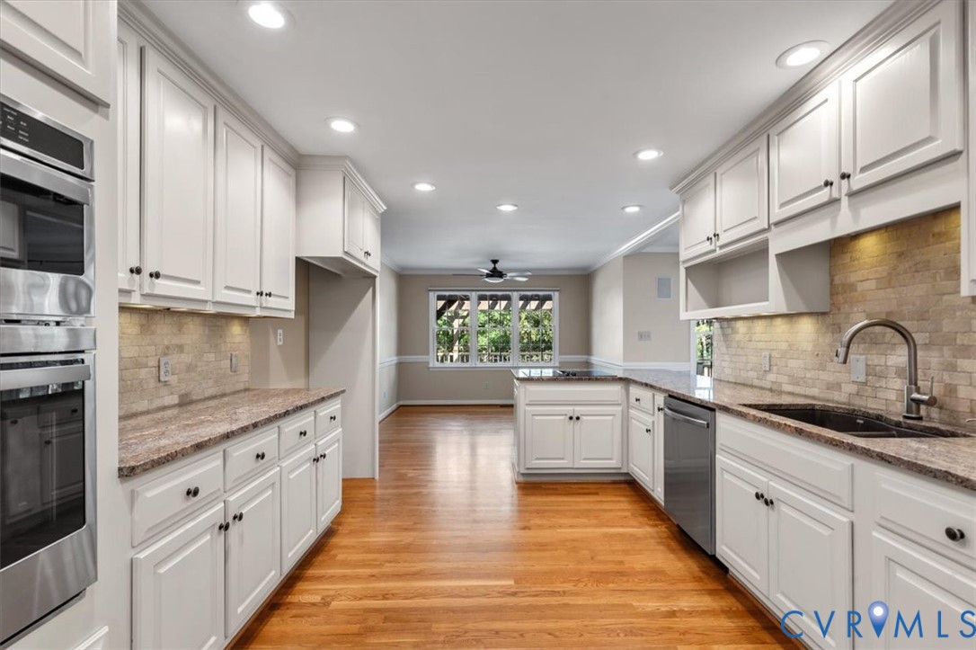 1437 Palmore Road Powhatan, VA 23139 - Photo 10 of 60 Bright kitchen featuring white shaker cabinetry, g
