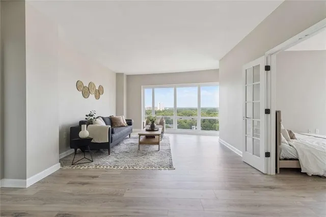 a living room with furniture and a window