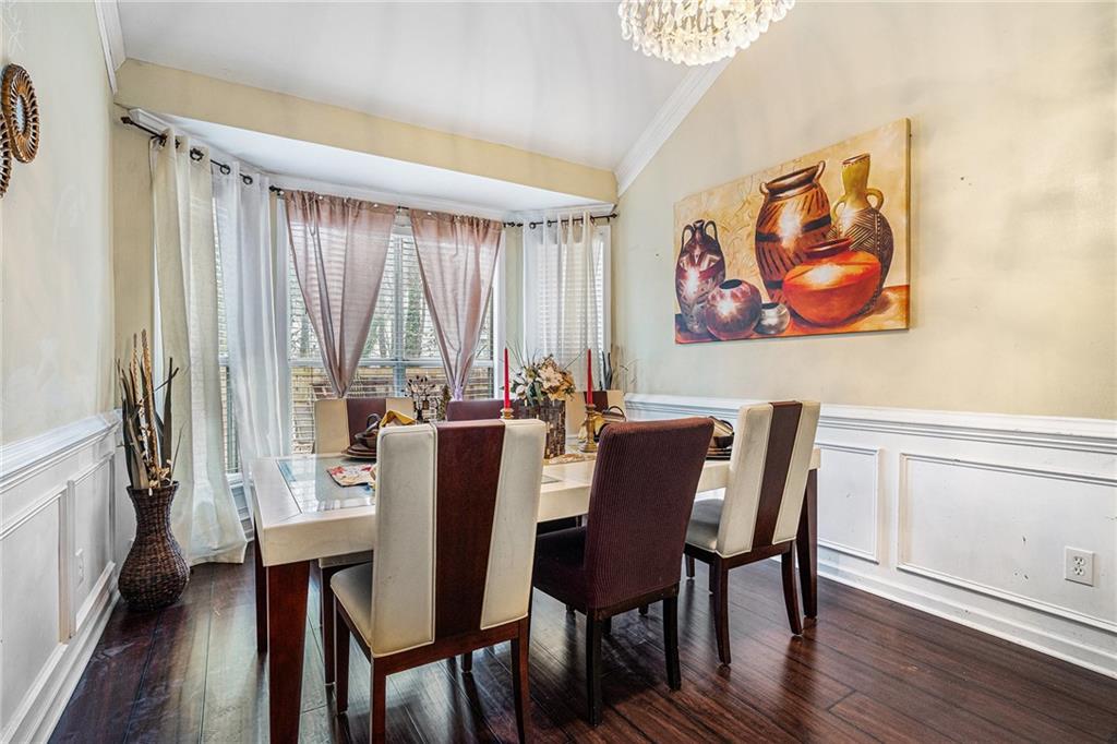 6507 Rebecca Way Lithonia, GA 30058 - Photo 13 of 31 a view of a dining room with furniture window and wooden floor