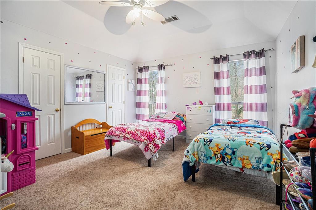 6507 Rebecca Way Lithonia, GA 30058 - Photo 23 of 31 a bedroom with bed and a window