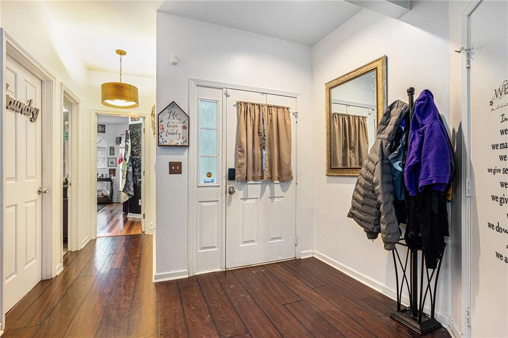 6507 Rebecca Way Lithonia, GA 30058 - Photo 4 of 31 a view of walk in closet with clothes and shoes