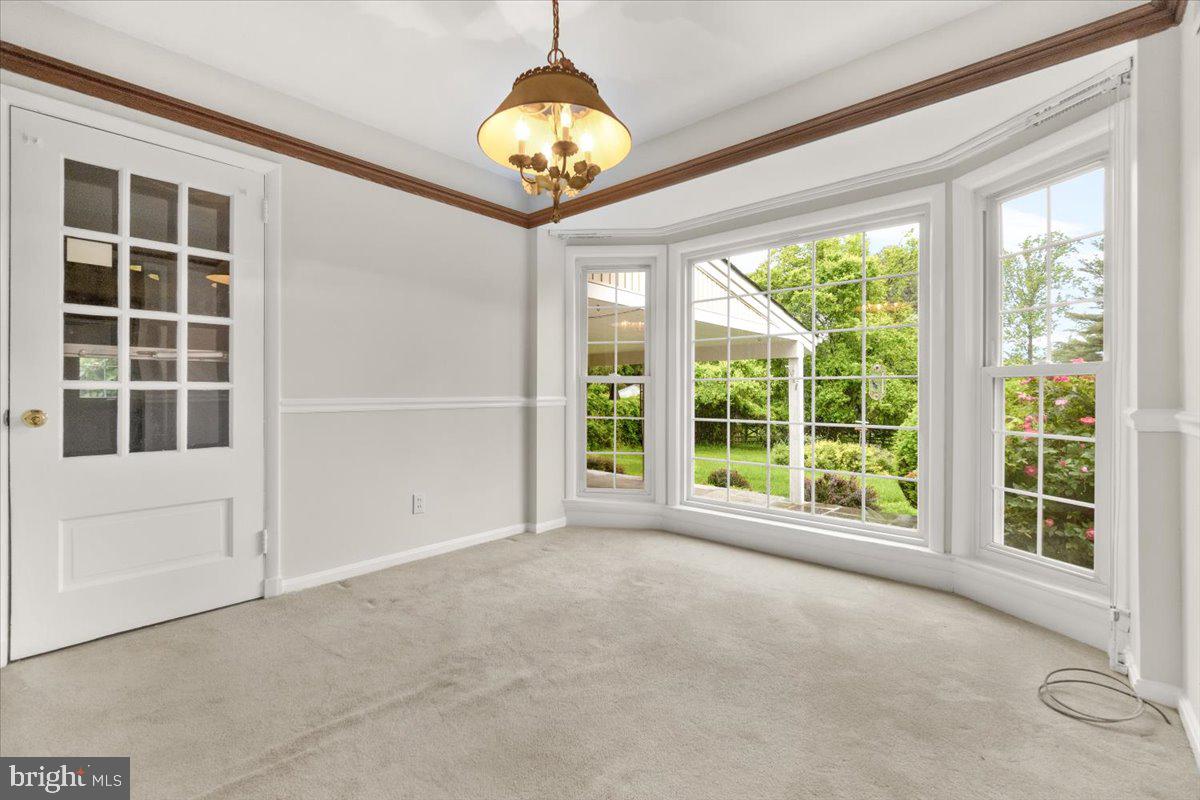 704 Ednor Road Ashton, MD 20861 - Photo 14 of 39 a view of an empty room with a window