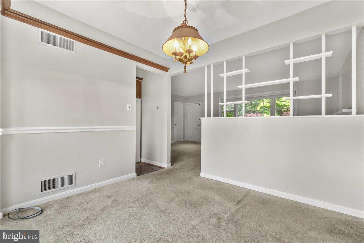 704 Ednor Road Ashton, MD 20861 - Photo 15 of 39 a view of an empty room with a window