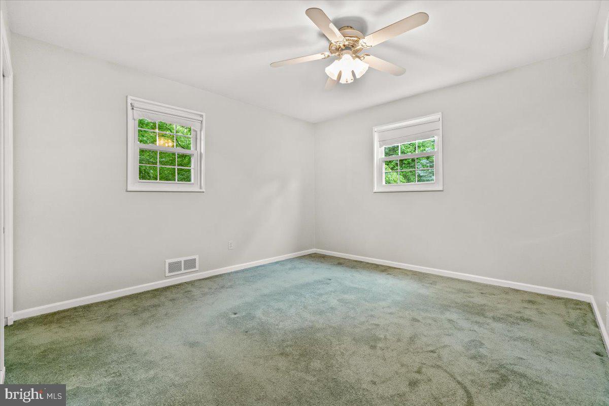 704 Ednor Road Ashton, MD 20861 - Photo 25 of 39 an empty room with a window