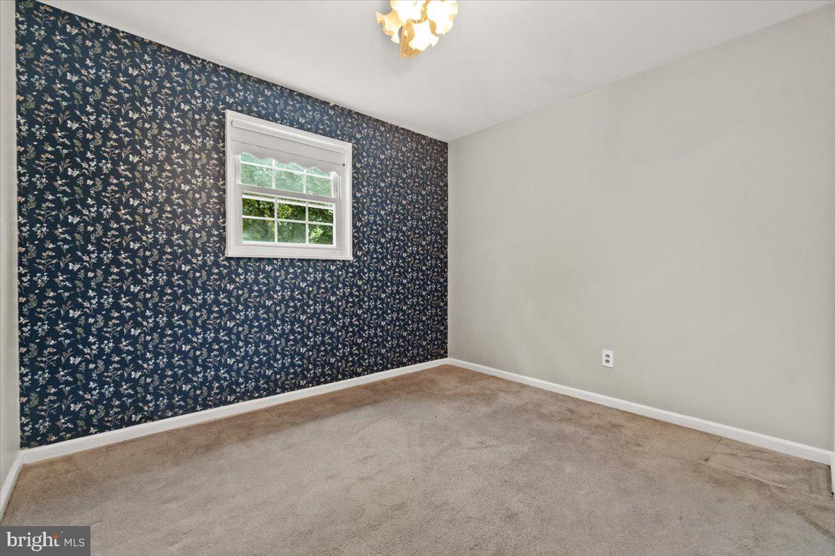 704 Ednor Road Ashton, MD 20861 - Photo 26 of 39 a view of a window in an empty room
