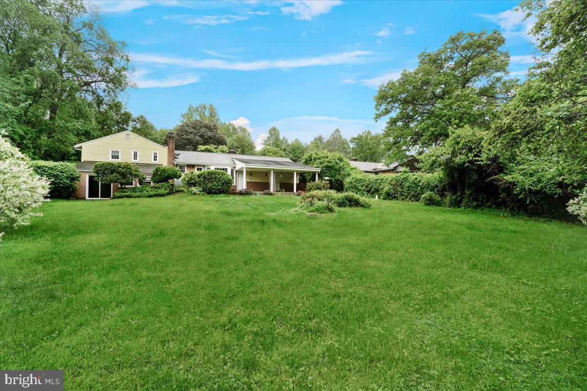 704 Ednor Road Ashton, MD 20861 - Photo 5 of 39 a view of a house with a big yard