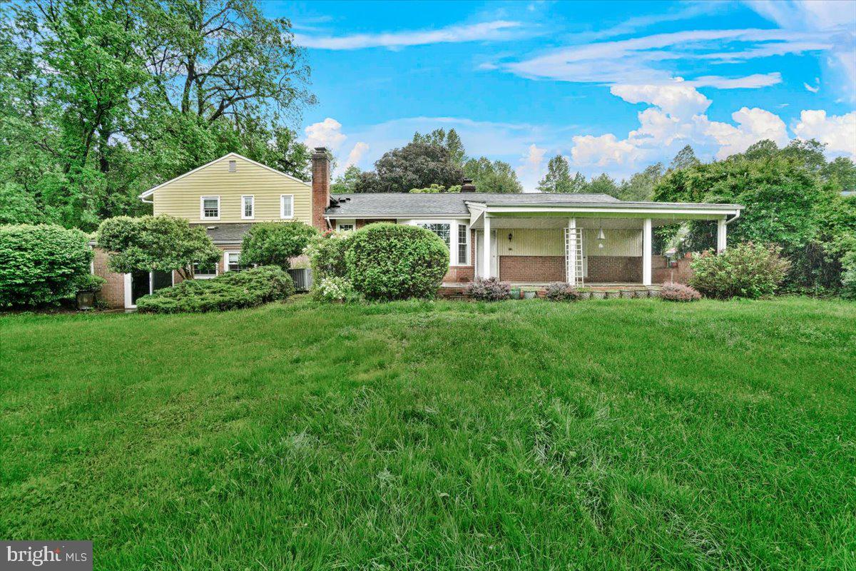704 Ednor Road Ashton, MD 20861 - Photo 6 of 39 a front view of a house with a yard