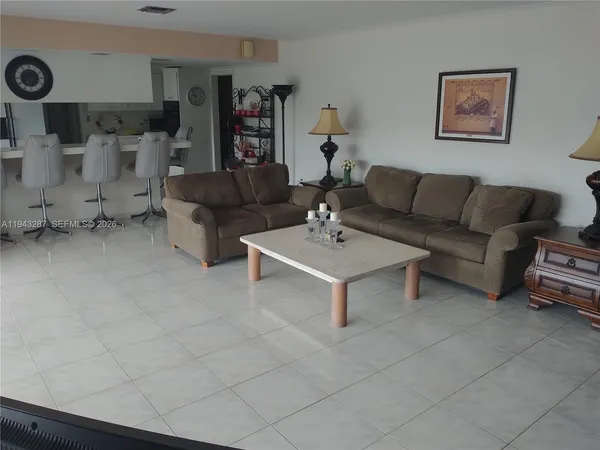 a living room with furniture and a couch