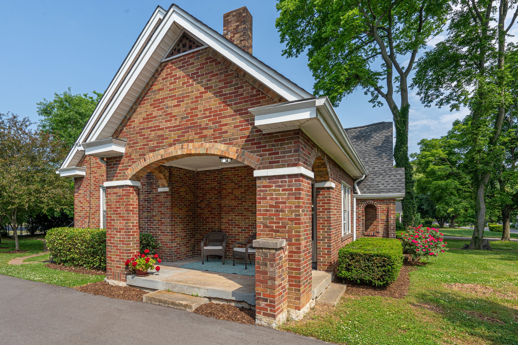 233 Cherokee Road Nashville, TN 37205 - Photo 3 of 29 a front view of a house with a yard