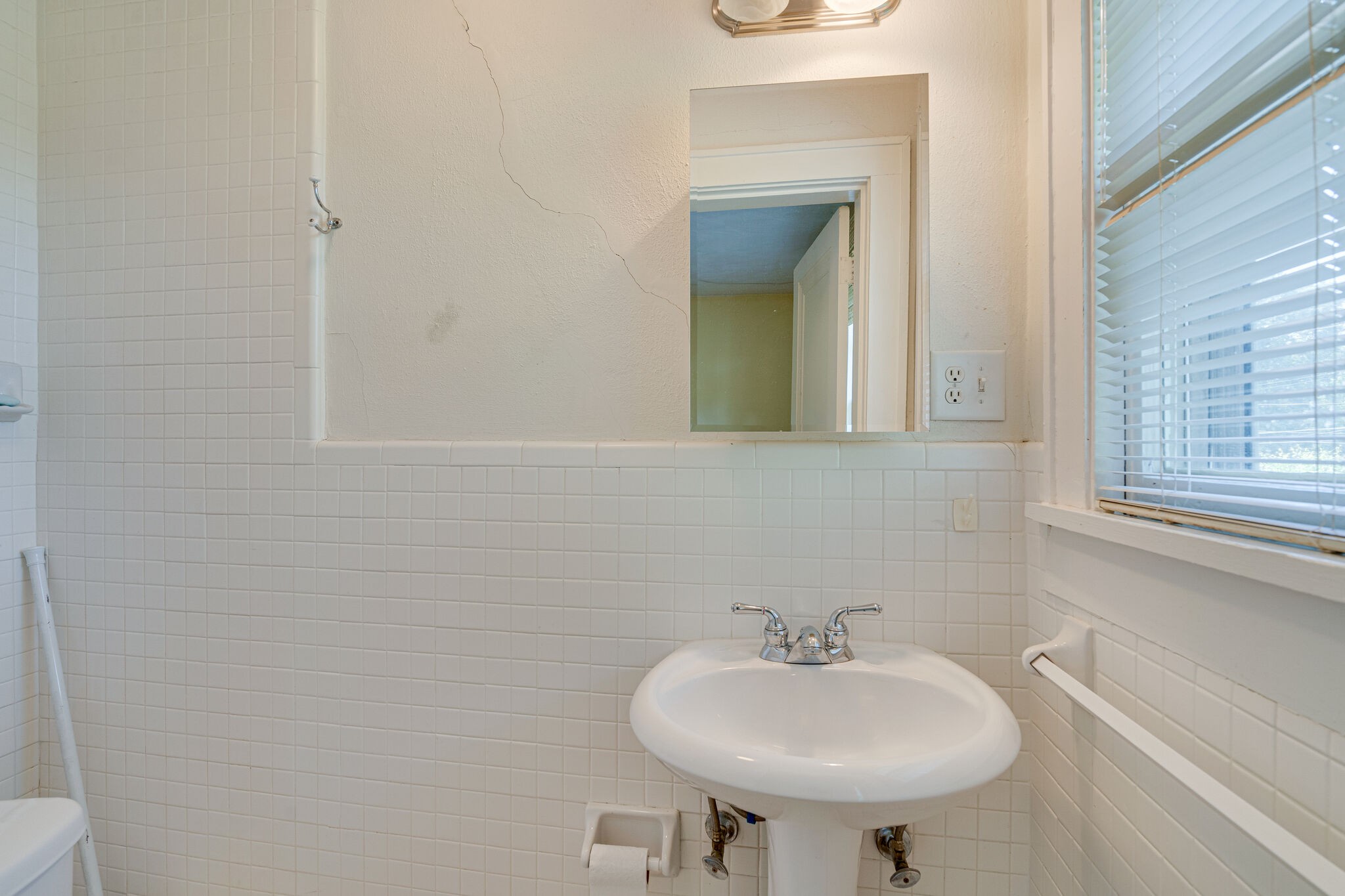 233 Cherokee Road Nashville, TN 37205 - Photo 23 of 29 a bathroom with a sink and a mirror