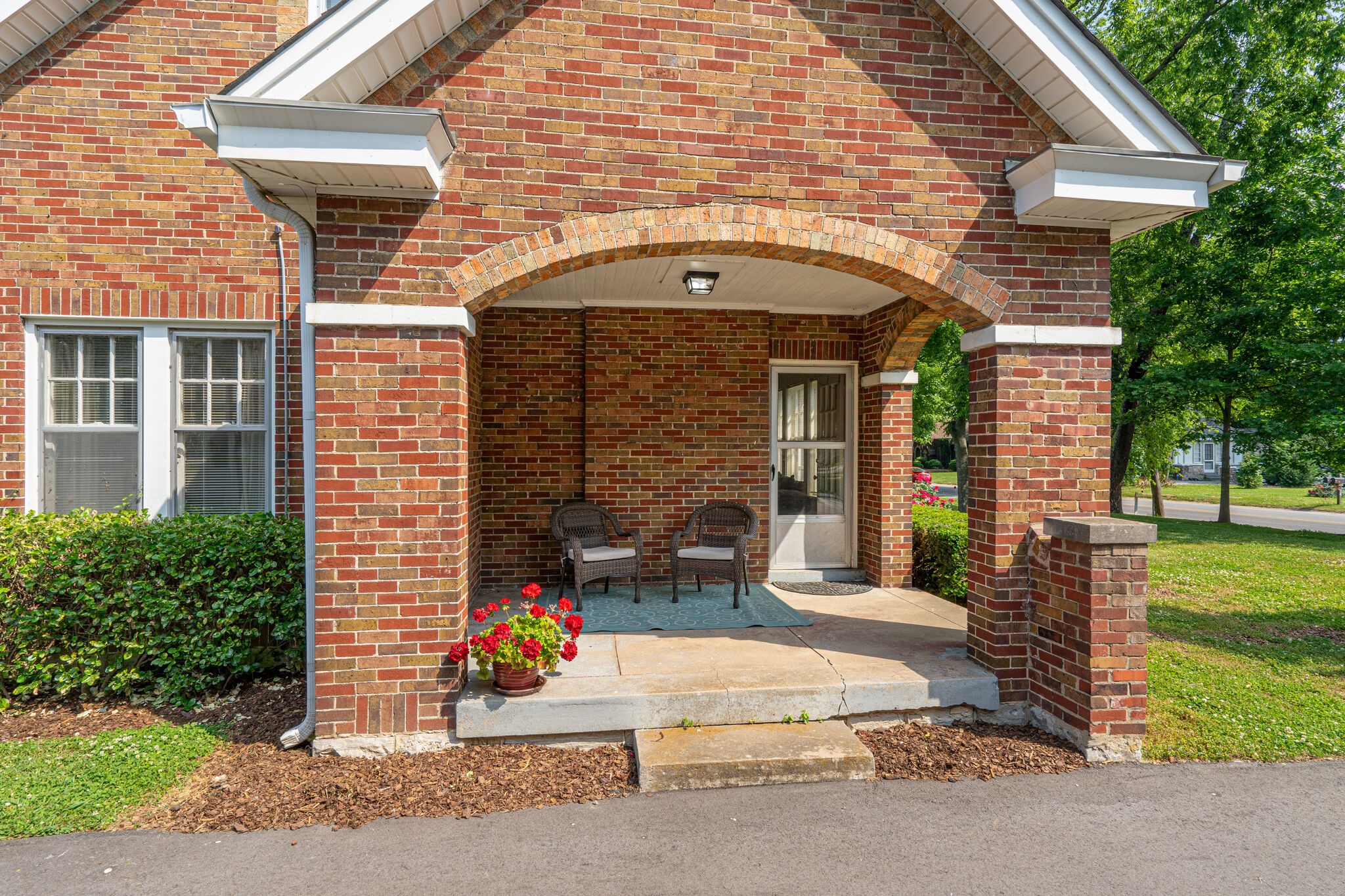 233 Cherokee Road Nashville, TN 37205 - Photo 29 of 29 a front view of a house with a garden