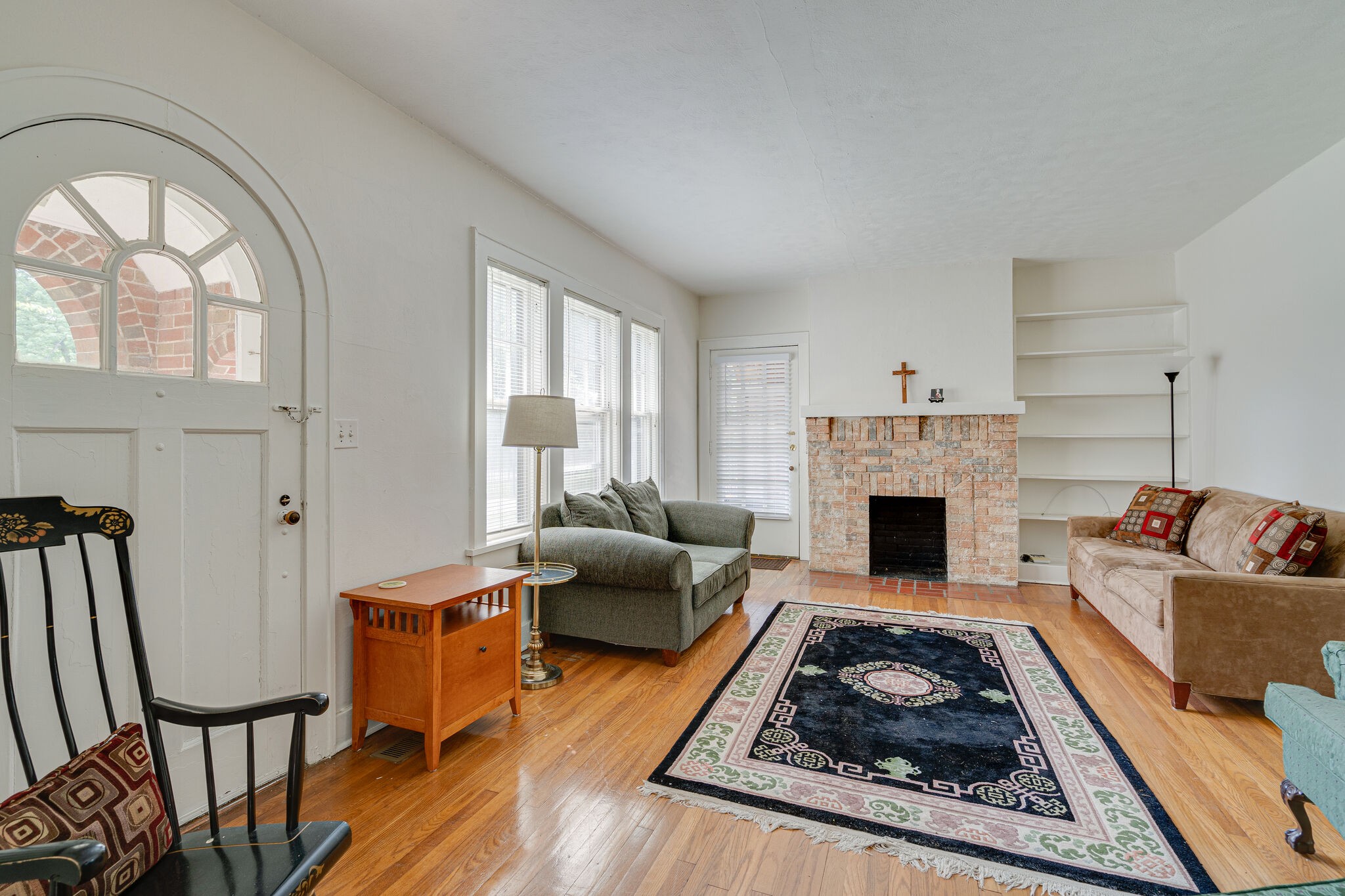 233 Cherokee Road Nashville, TN 37205 - Photo 5 of 29 a living room with furniture and a fireplace